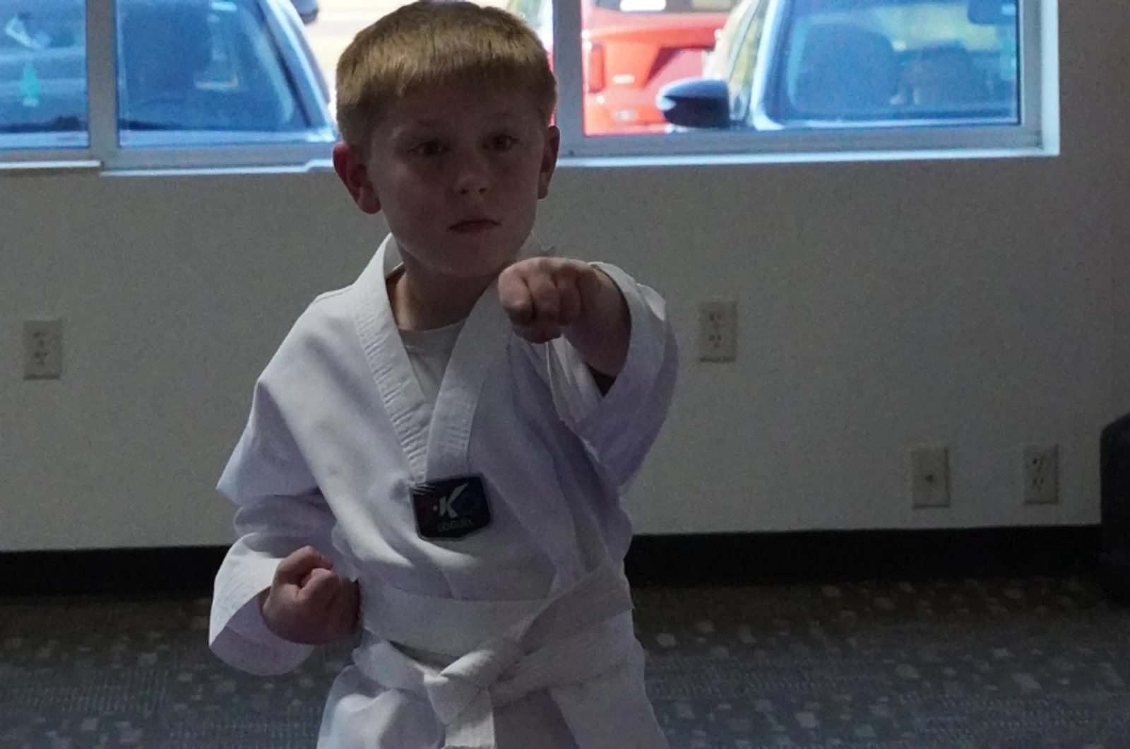 Child building confidence in martial arts